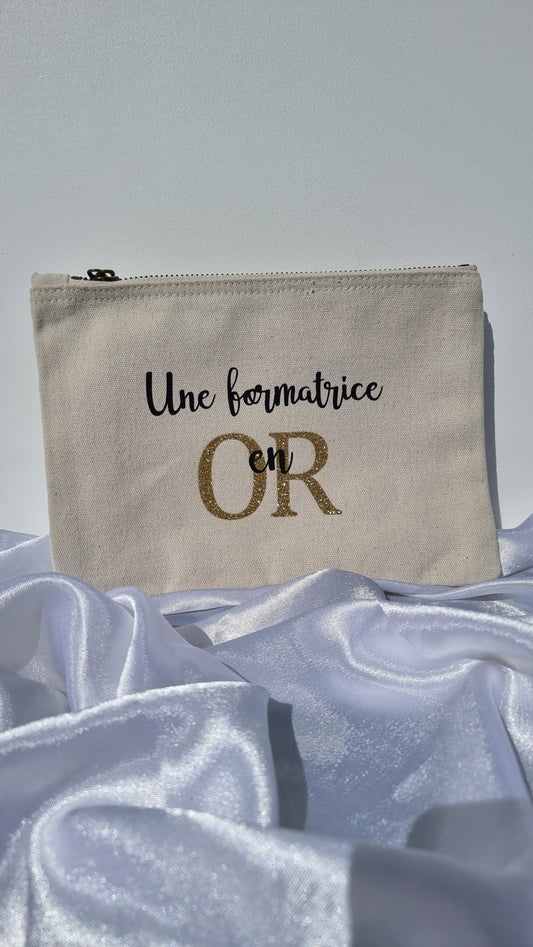 Trousse " Une ... en OR "